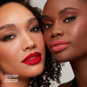 Revlon Manifest next to coin for size-scale clarity and travel convenience