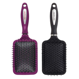 Revlon close-up of large paddle face highlighting bristles and smooth glide benefit