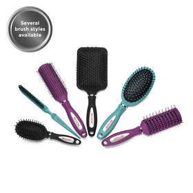 Revlon brush held in hand for scale showing comfortable size and ergonomic benefit