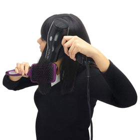 Revlon soft-touch handle detail showing rubberized grip for better control