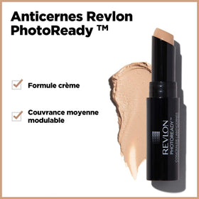 Revlon concealer stick held in hand showing compact travel-friendly size
