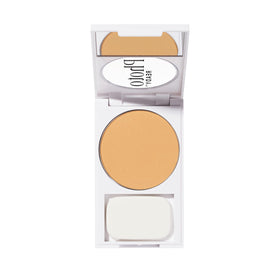 Revlon PhotoReady compact inside purse in lifestyle scene showing portability benefit: quick on-the-go shine control