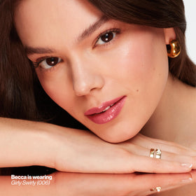 REVLON Rum Raisin swatch on lips showing red-brown depth and glossy coverage