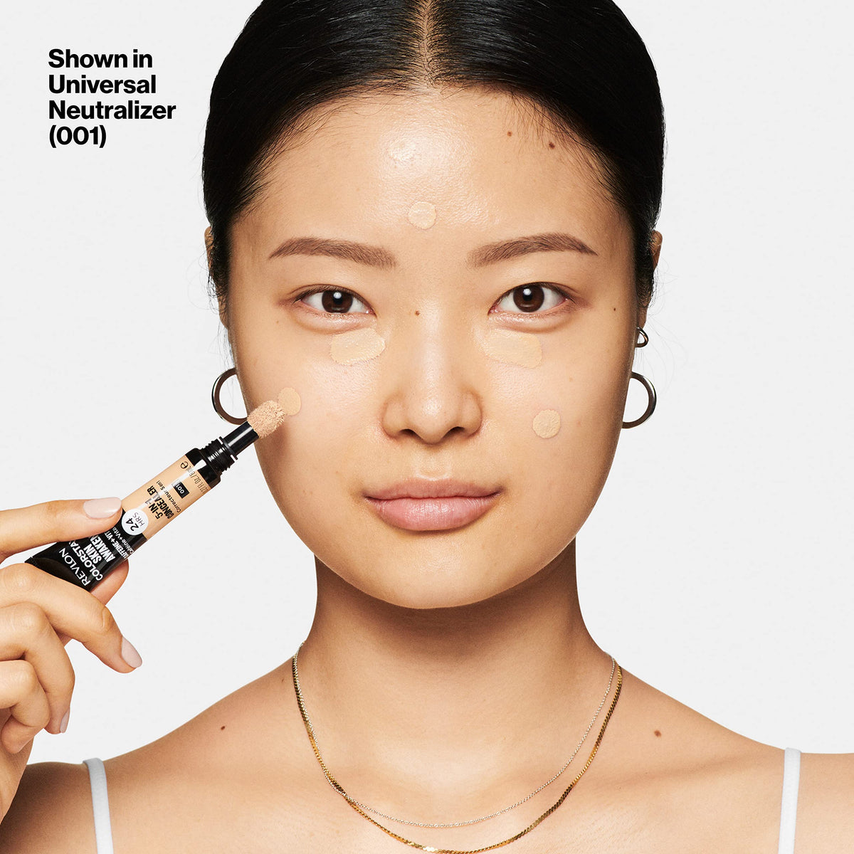 Revlon swatches on arm showing universal neutralizer balancing discoloration benefit