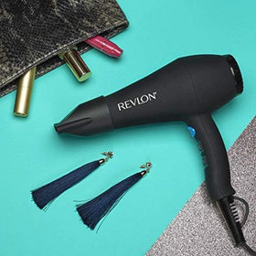 Revlon dryer held in hand to show size and comfortable soft-feel grip benefits