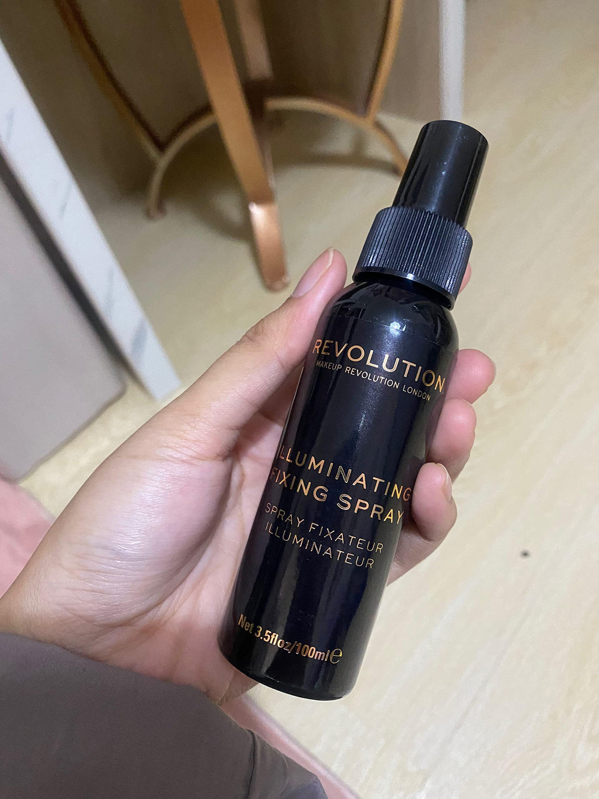 Revolution Beauty London fine mist close-up demonstrating even fast-drying spray