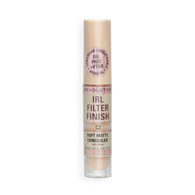 Revolution concealer on a vanity with brush illustrating everyday makeup routine benefit