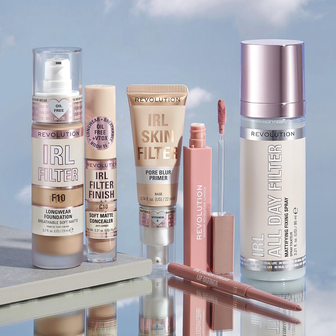 Revolution concealer tube next to coin conveying compact travel-friendly size benefit