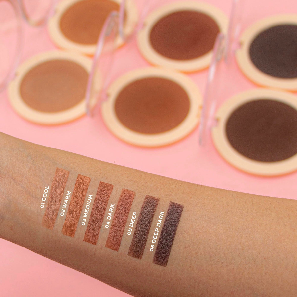 Revolution Mega Bronzer size comparison next to hand for compact portability benefit