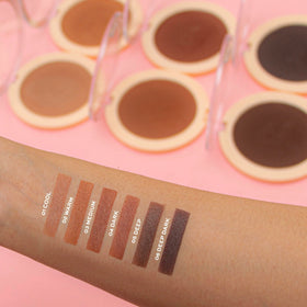 Revolution four shades swatched on arm illustrating depth options for selection