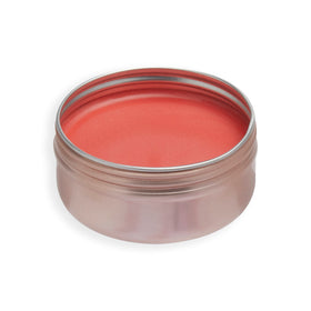 Revolution Beauty London swatched on cheek close-up showing natural peach glow improves complexion