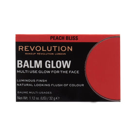 Revolution Beauty London held in hand for scale showing compact size ideal for travel