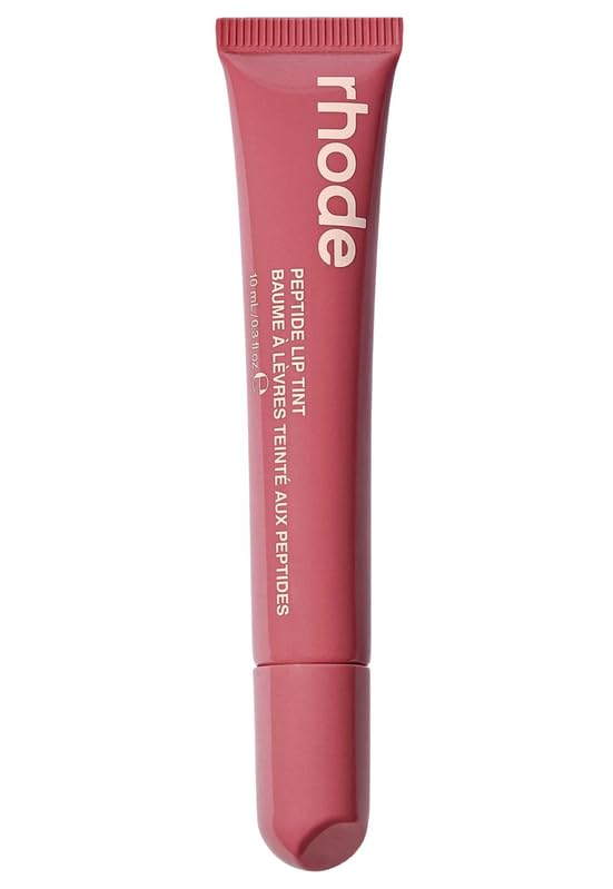 Rhode lip tint front tube showing glossy Salty Tan and compact size benefit