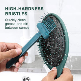 RHOS in use pulling hair from a round brush to speed up cleaning