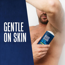 Applying Right Guard underarm in gym setting for dry comfort