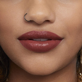 Evening lifestyle shot with Rimmel Provocalips Heart Breaker highlighting photogenic, lasting color benefit