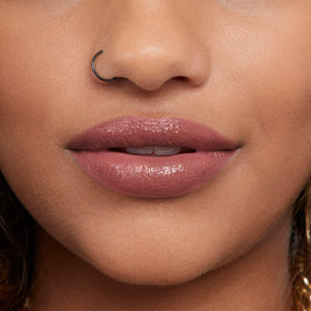 Rimmel provocalips worn in lifestyle setting showing all‑day wear benefit