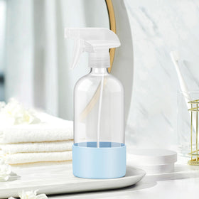 Rionisor bottle in use for hair styling showing even spray distribution