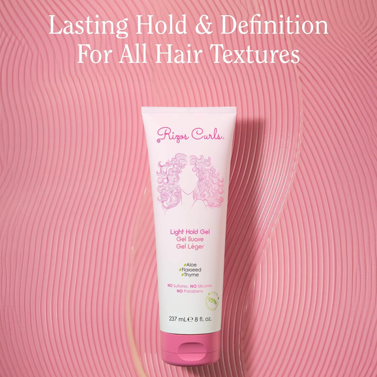 Rizos Curls 2.5 oz travel gel in hand showing compact size for travel