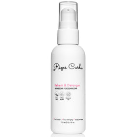 Rizos Curls front packaging showing travel spray and benefits