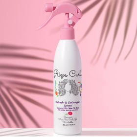Rizos Curls ingredients close-up with coconut, olive oil, and shea butter benefits