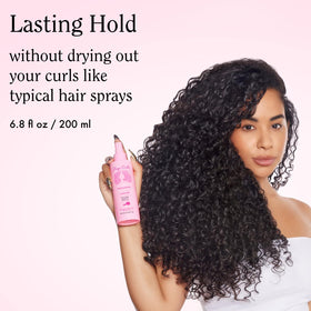 Rizos Curls spray mist in action delivering volume and frizz control