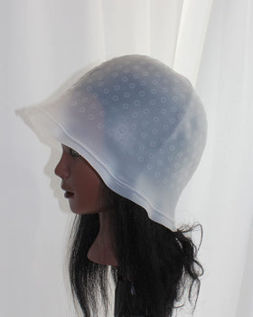 RJMBMUP hair strands pulled through cap highlighting controlled selection for cleaner results