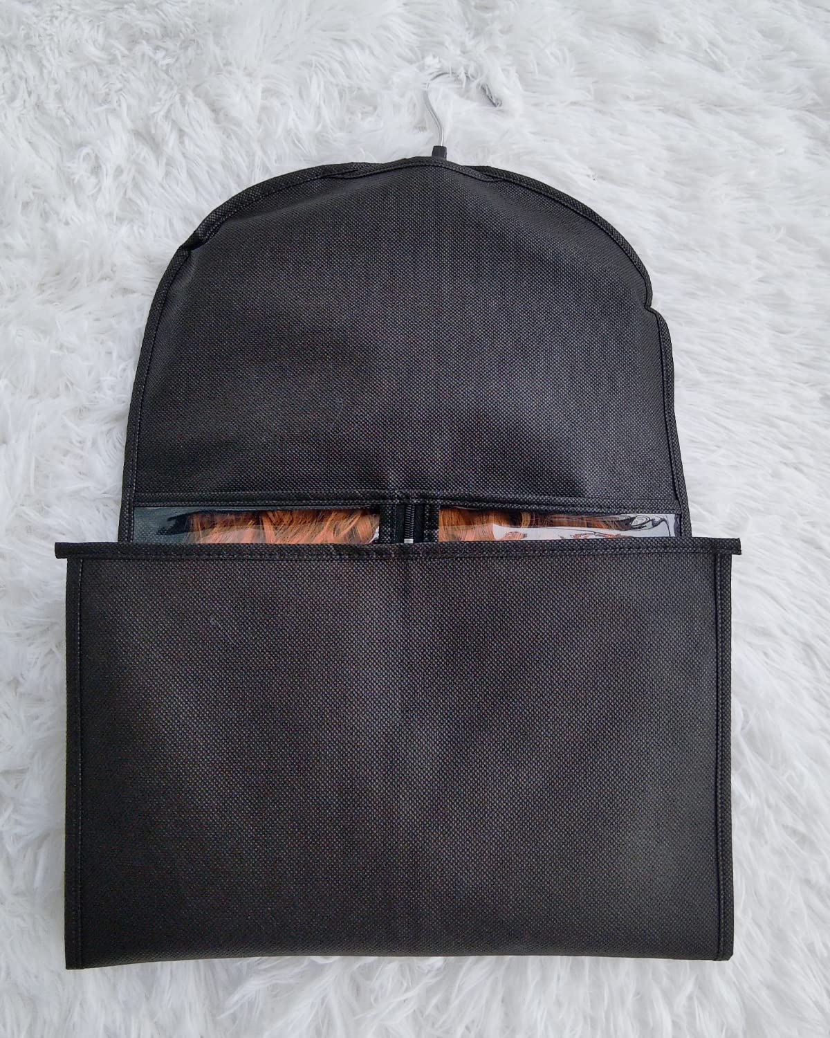 RJMBMUP bag hanging in wardrobe keeps salon pieces organized
