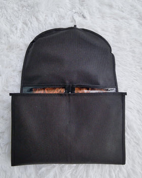 RJMBMUP bag hanging in wardrobe keeps salon pieces organized