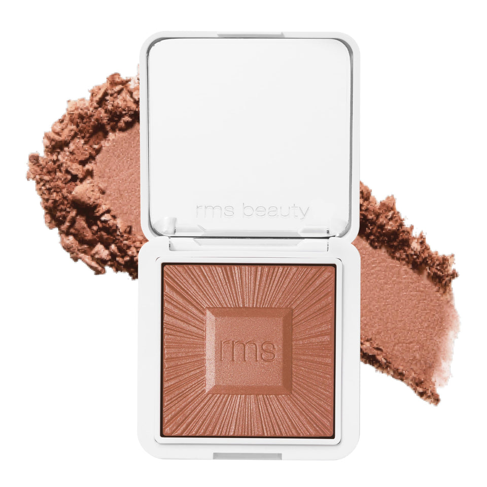 RMS Beauty compact front view showing sleek refillable design and portability