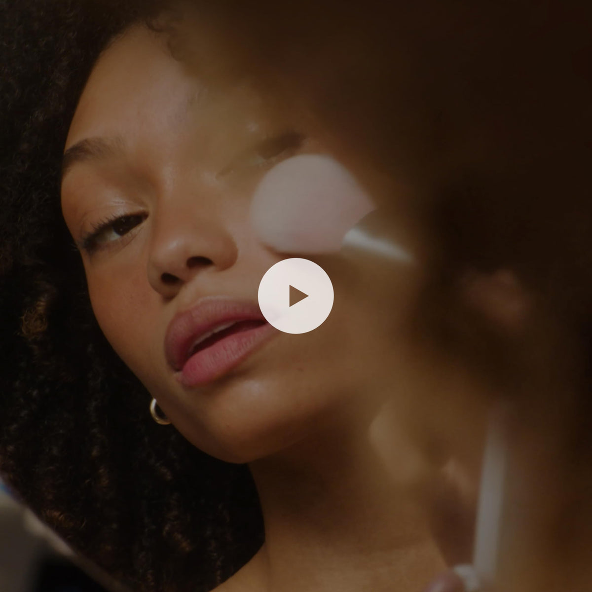 RMS Beauty compact beside everyday items showing compact size and convenience