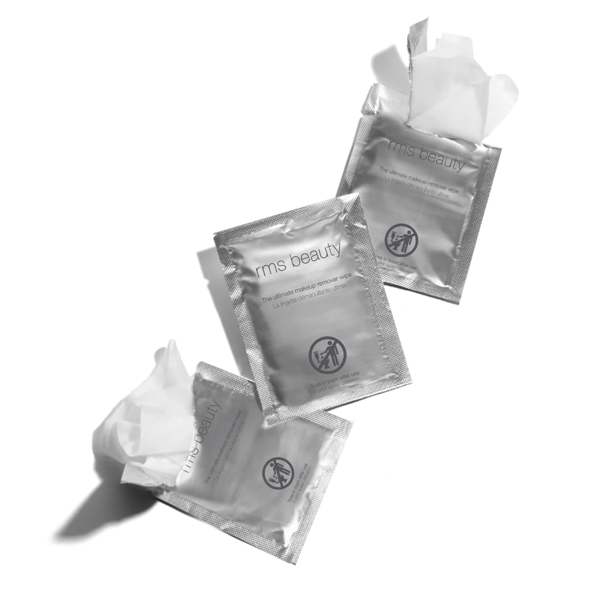 RMS Beauty wipe removing eye makeup showing gentle, no-tug cleansing for sensitive eyes