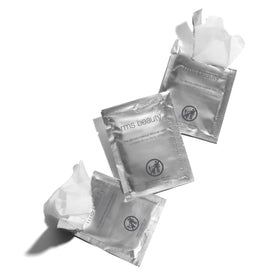 RMS Beauty wipe removing eye makeup showing gentle, no-tug cleansing for sensitive eyes