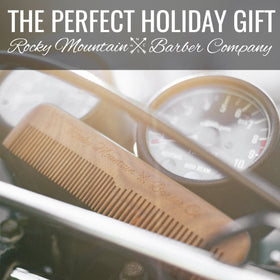 Rocky Mountain Barber Company comb in hand showing weighted grip for steady styling
