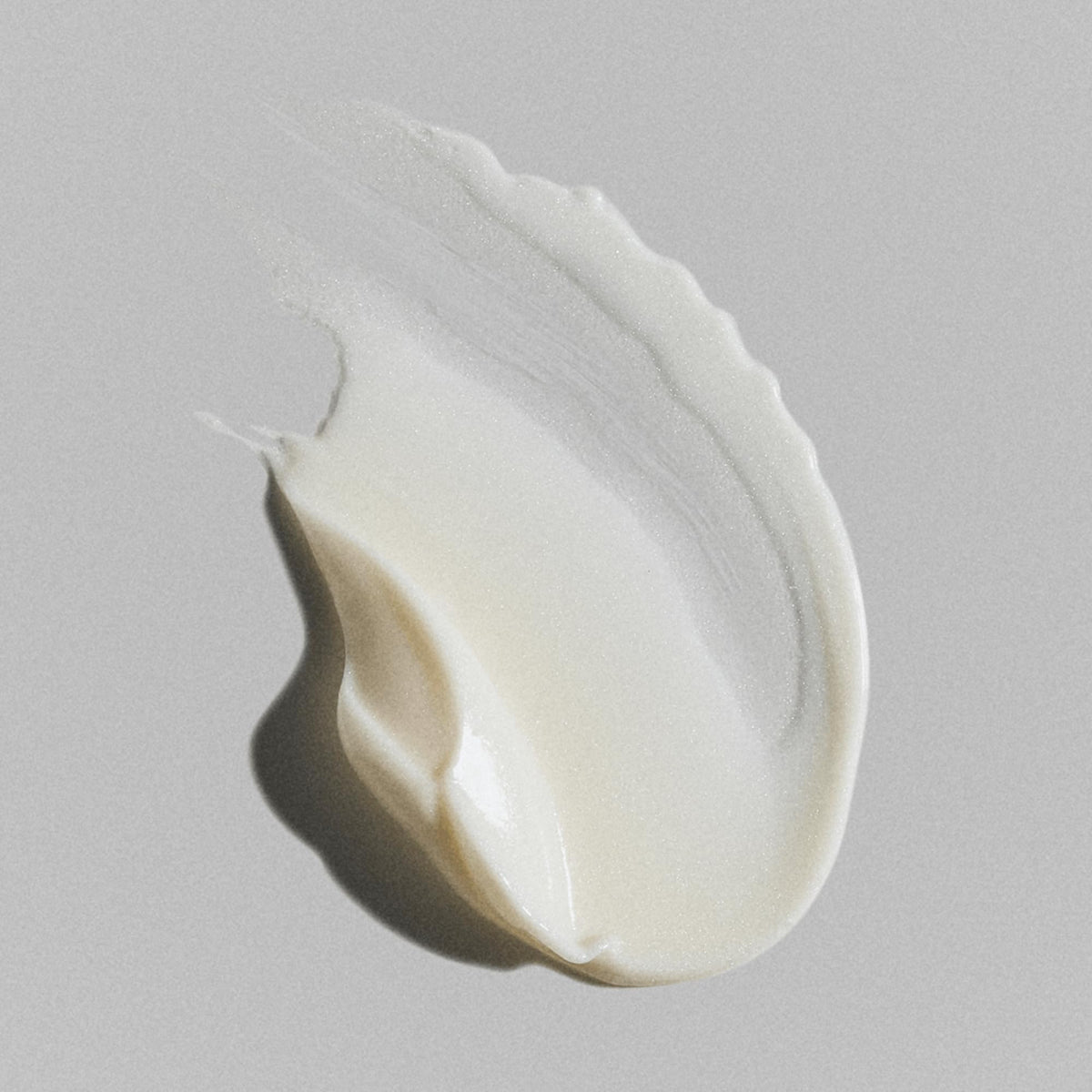 RODAN + FIELDS model applying eye cream in morning routine for refreshed look