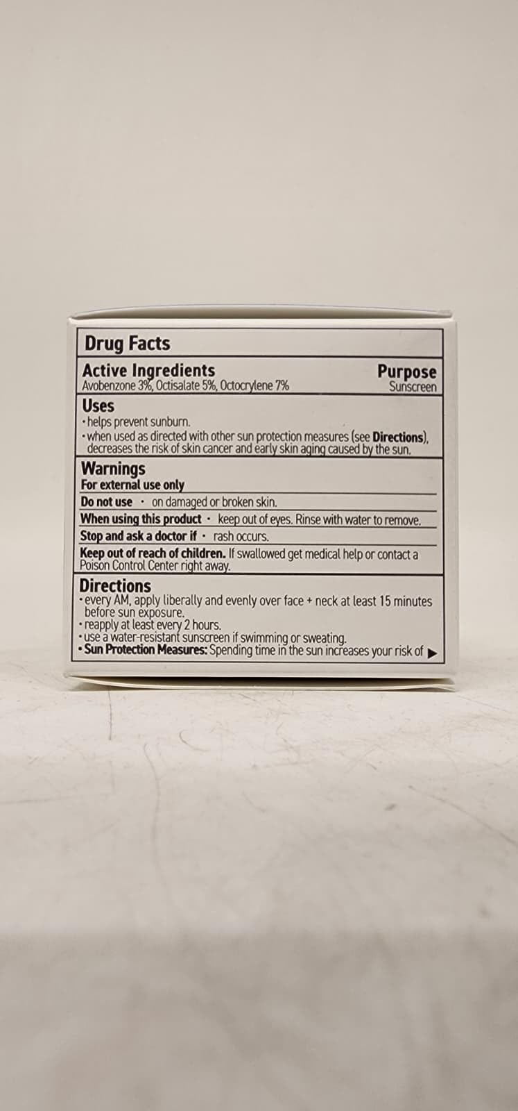 Rodan + Fields tube next to travel pouch for on-the-go protection
