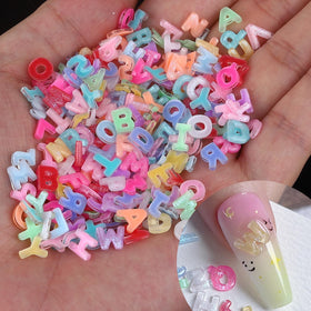 ROFIBUT pouch of 250 colorful letter charms showing variety and convenience