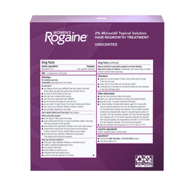Rogaine bottle held in hand showing size and three-month supply convenience