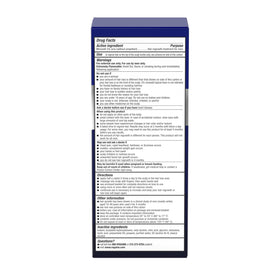 Rogaine bottle on bathroom counter in grooming routine lifestyle setting