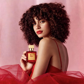 Roiii close-up of red apple and lychee notes highlighting fresh top accord