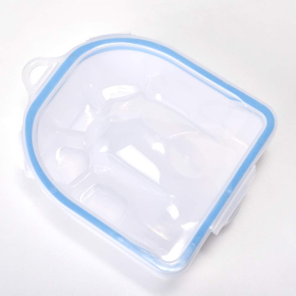 Rolabling bowl beside hand for scale showing compact size and fingertip immersion benefit