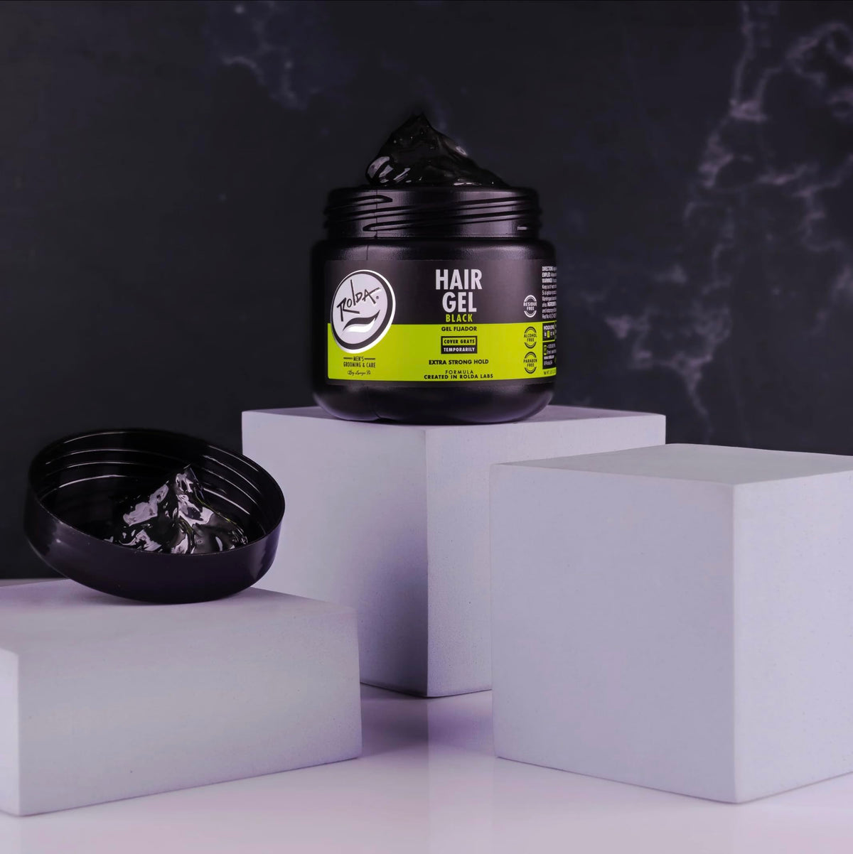 Rolda open cap showing black gel texture, brand demonstrates easy scoop application
