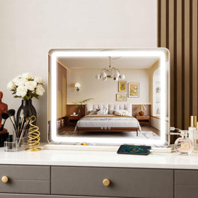 ROLOVE mirror next to hand for scale showing large size and full-view advantage