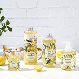 ROMIIE ZOI bottle on a kitchen sink illustrating fresh lemon scent for home use