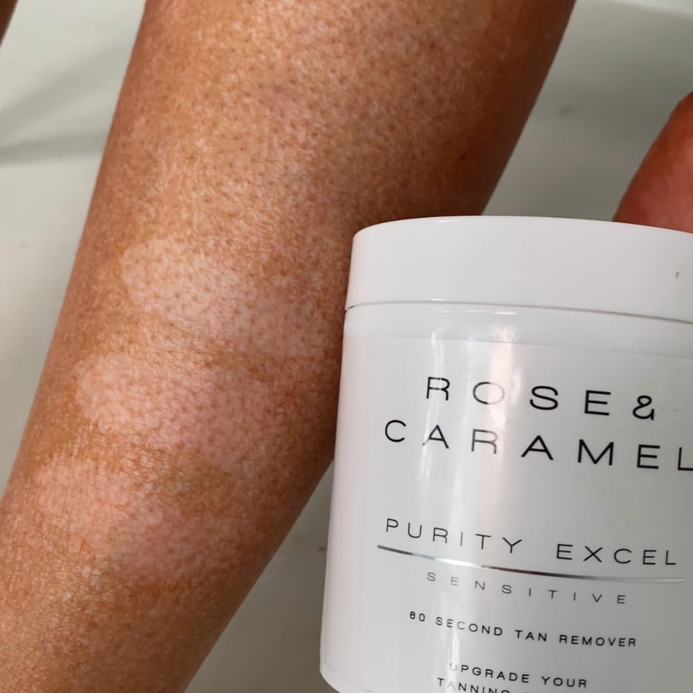 Rose & Caramel bottle next to hand showing 440ml size and convenience