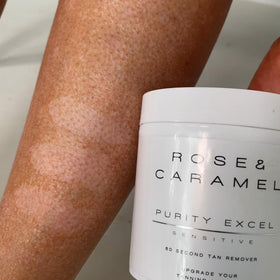 Rose & Caramel bottle next to hand showing 440ml size and convenience