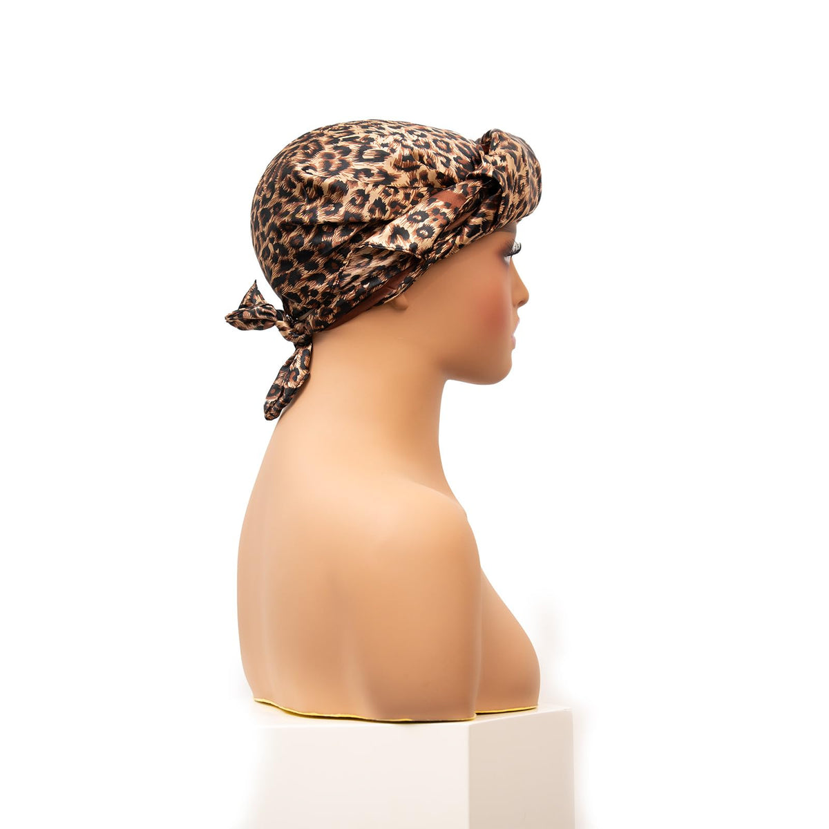ROSEBONY cap in use on sleeping woman protecting silk press and reducing frizz