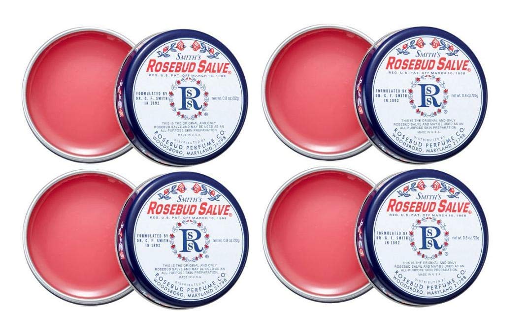 Rosebud Perfume front tin showing label and compact size with easy carry benefit