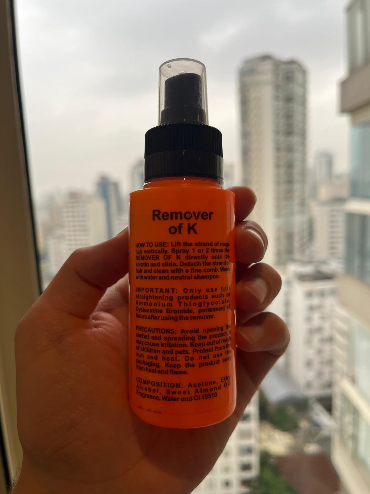 Rosy Fharia Keratin FiX 100ml next to a tape measure showing travel-friendly size