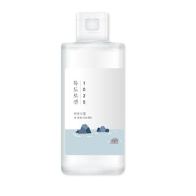 ROUND LAB 1025 Dokdo Lotion front packaging showing bottle and label benefit